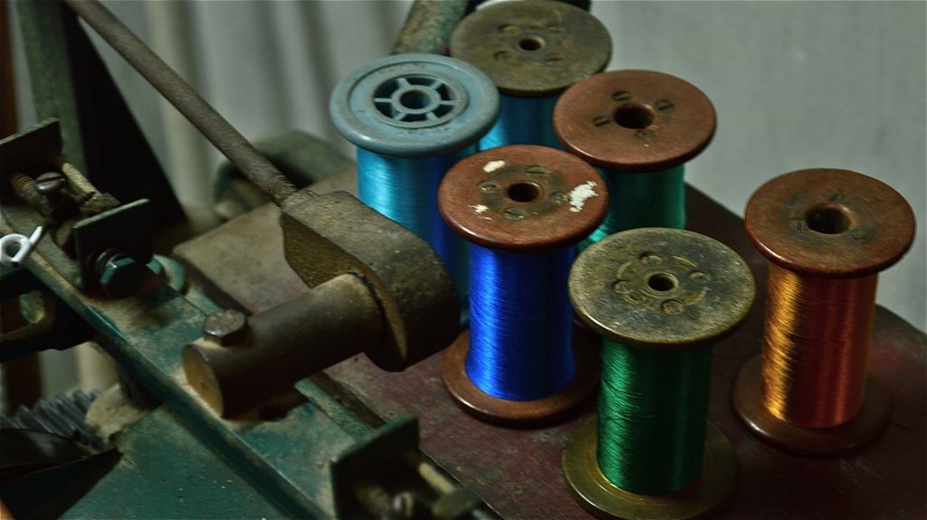 Bobbins with colourful silk thread