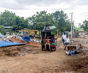 A family that has somehow managed to find another house in Anantapur town moves to their new home